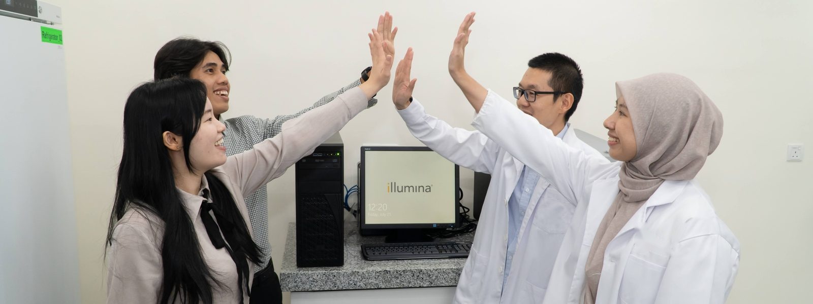 The Neo Nexon laboratory team celebrating together