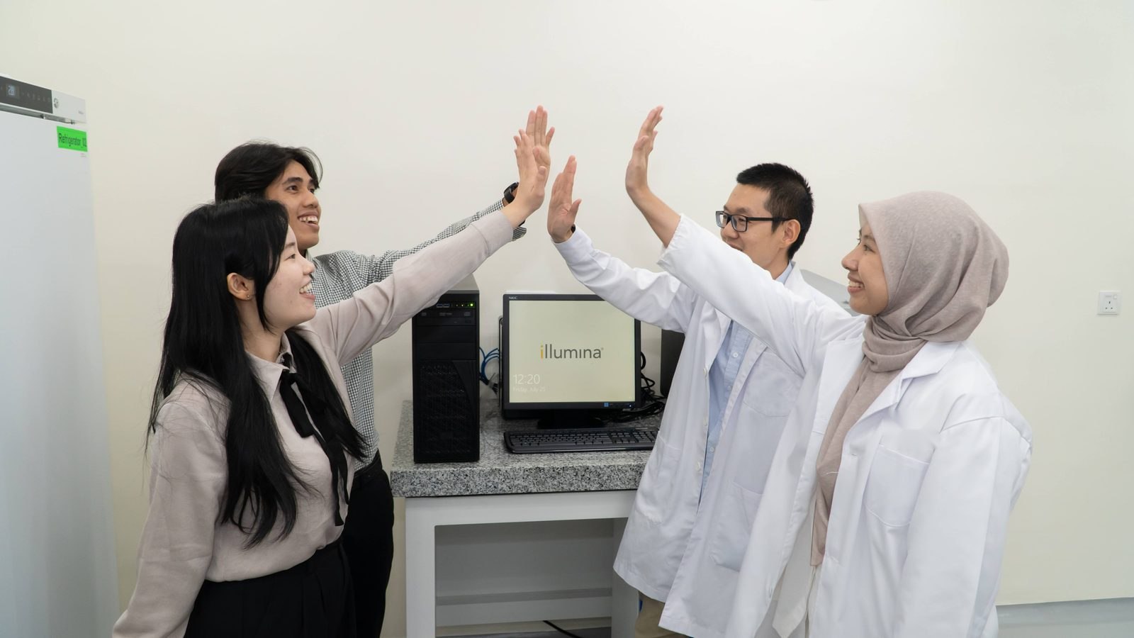 The Neo Nexon laboratory team celebrating together